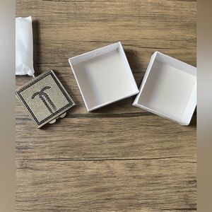 NIB: A designer inspo compact mirror with box.